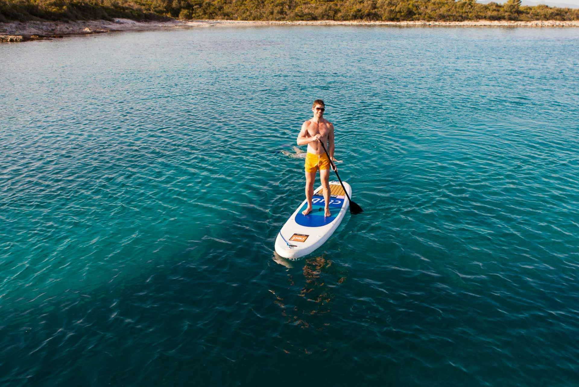 Man paddle-boarding in Montenegro