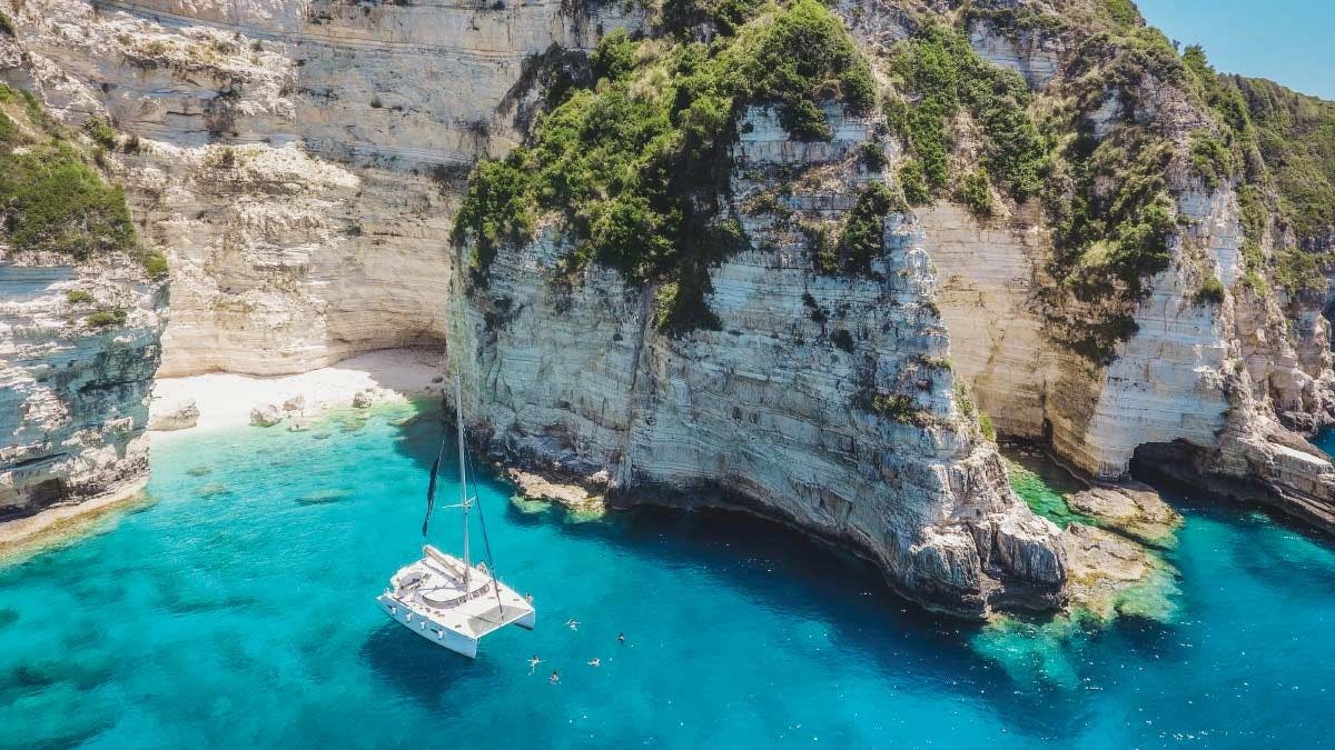 Yacht Getways catamaran anchored in a beautiful bay in Corfu