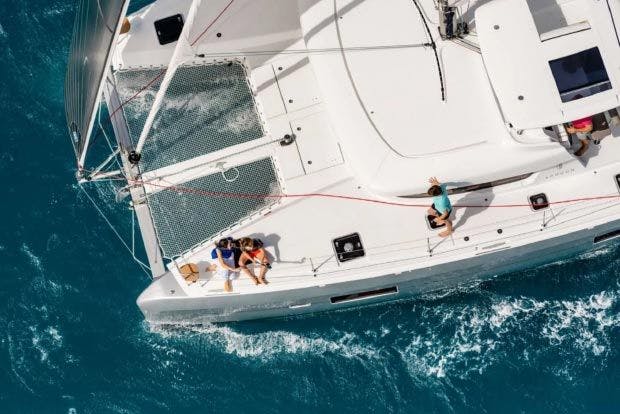Image of Superior Yacht bow with guests relaxing