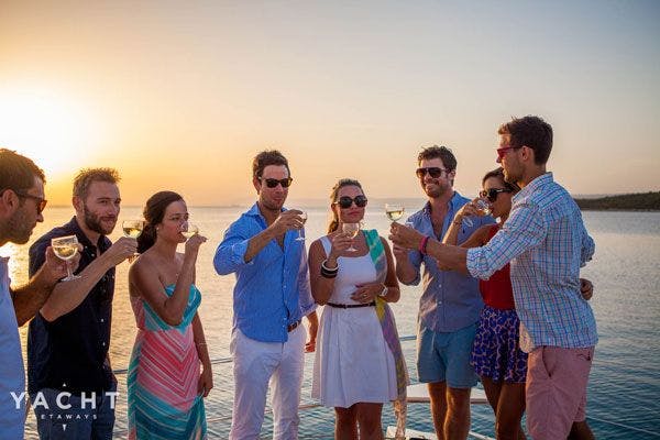 Sip drinks at sundown - One of the best sailing holiday experiences