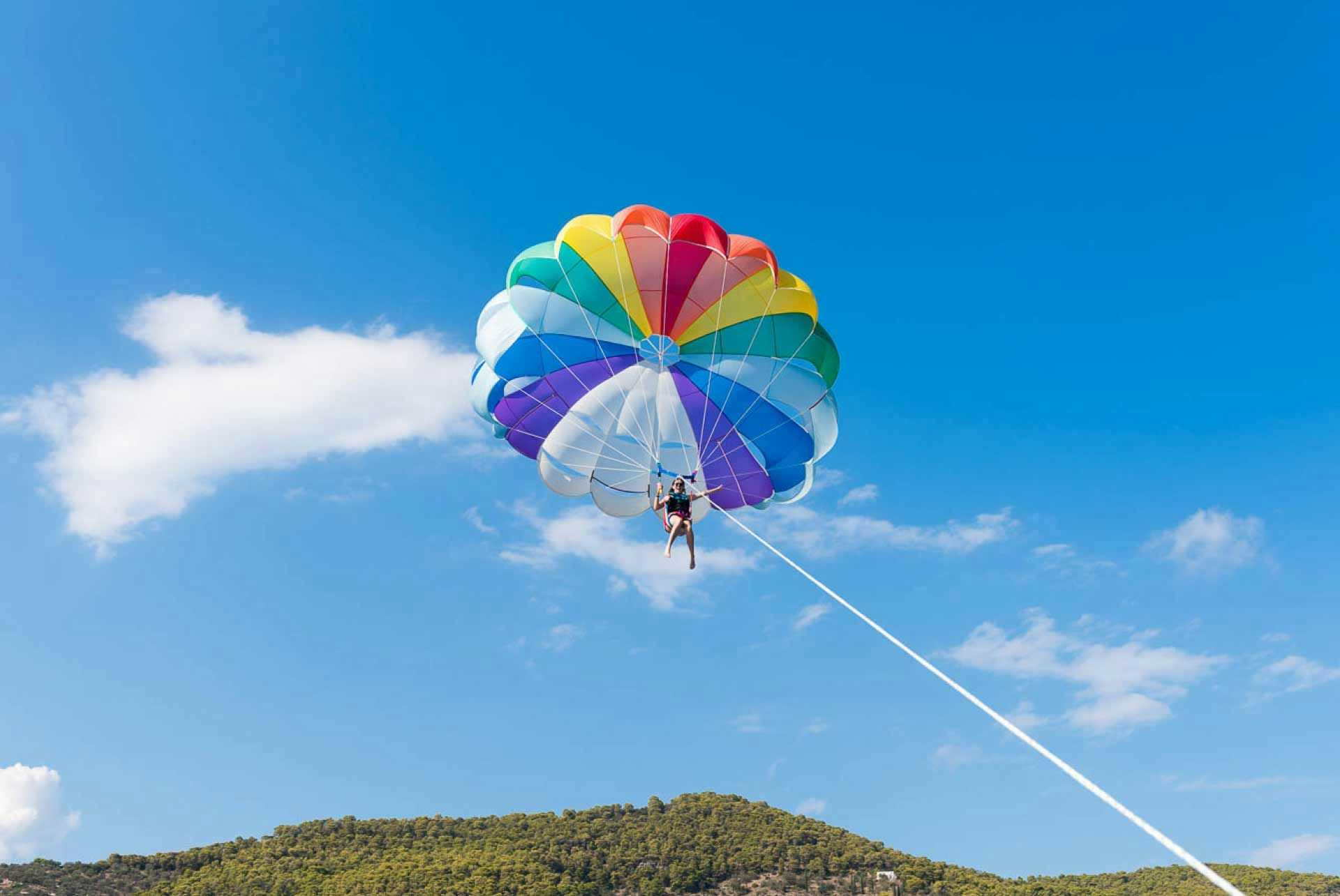 Woman parasailing in Budva