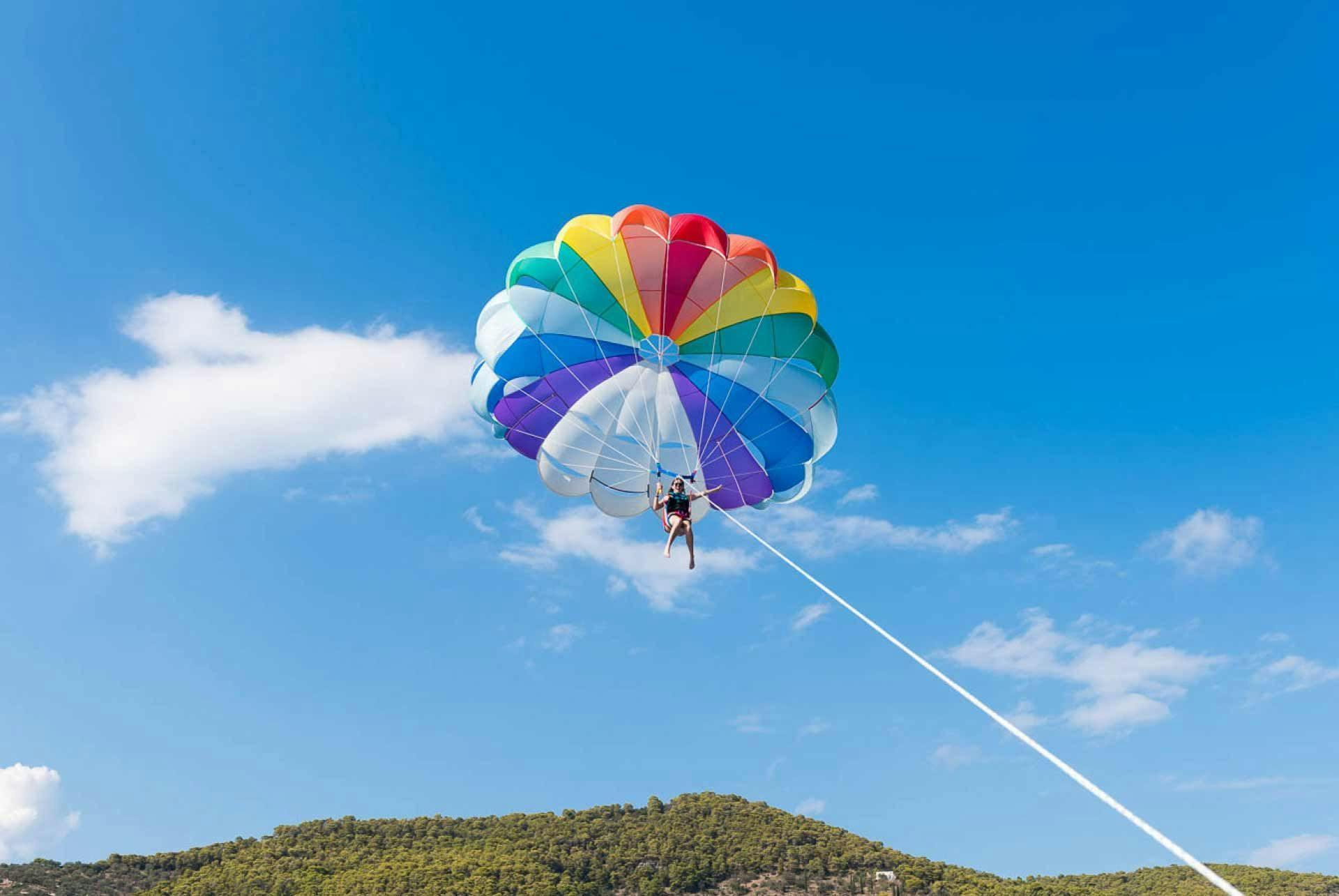 Woman parasailing in Budva