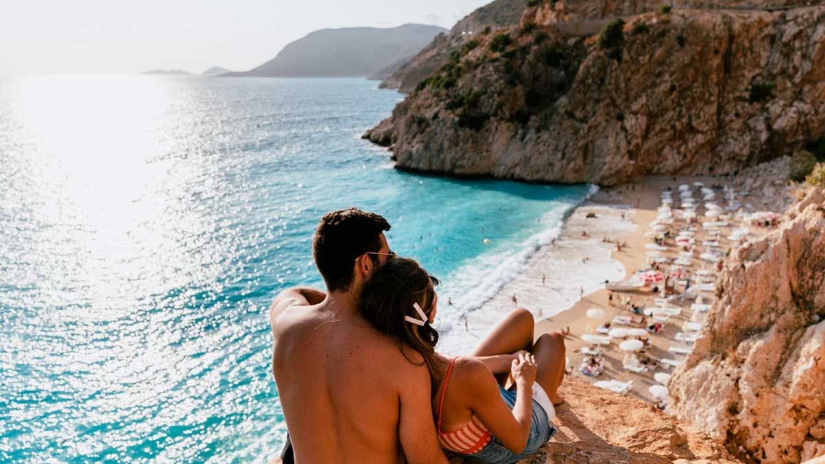 Couple relaxing at beach in Turkey