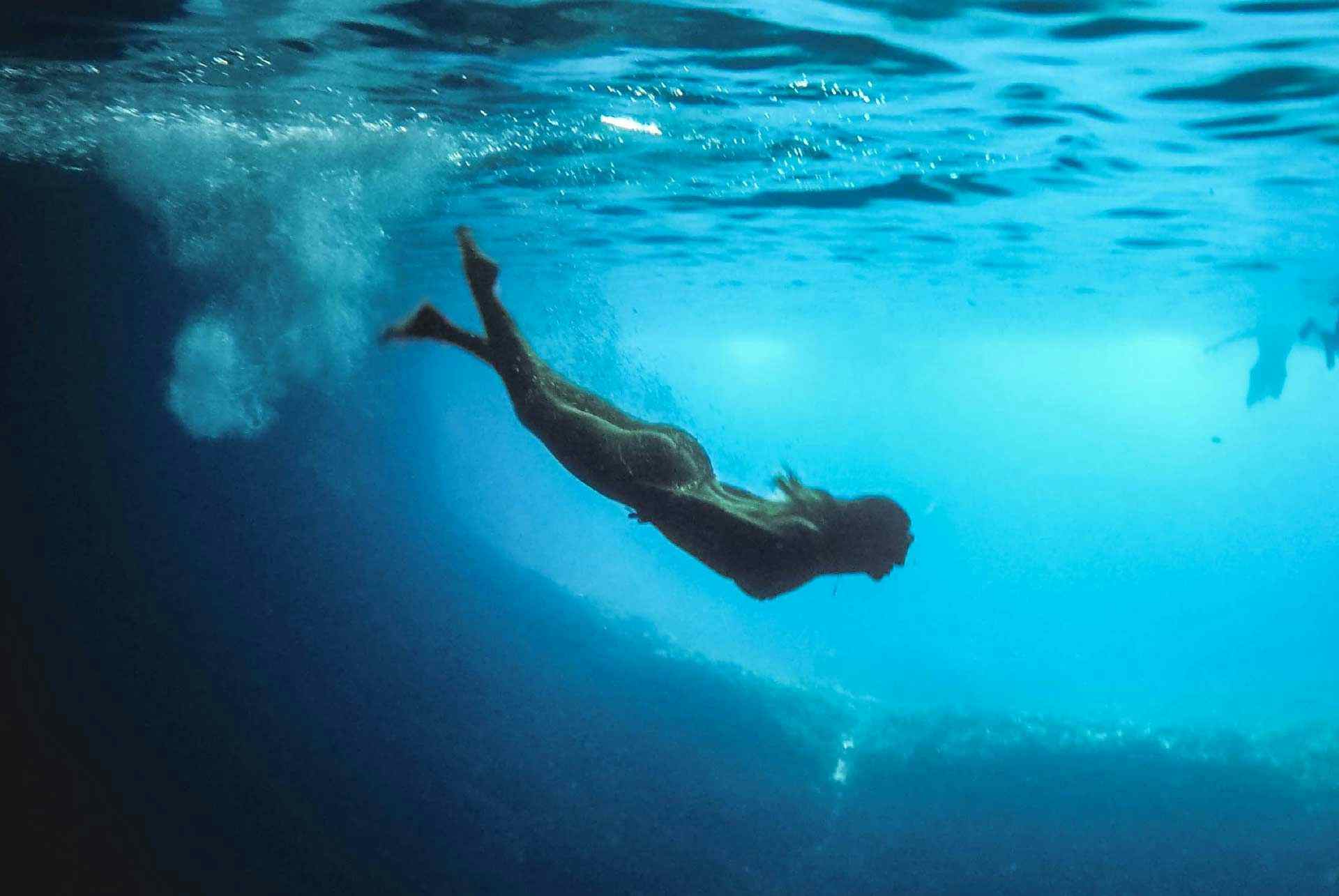 Woman snorkelling in Greece