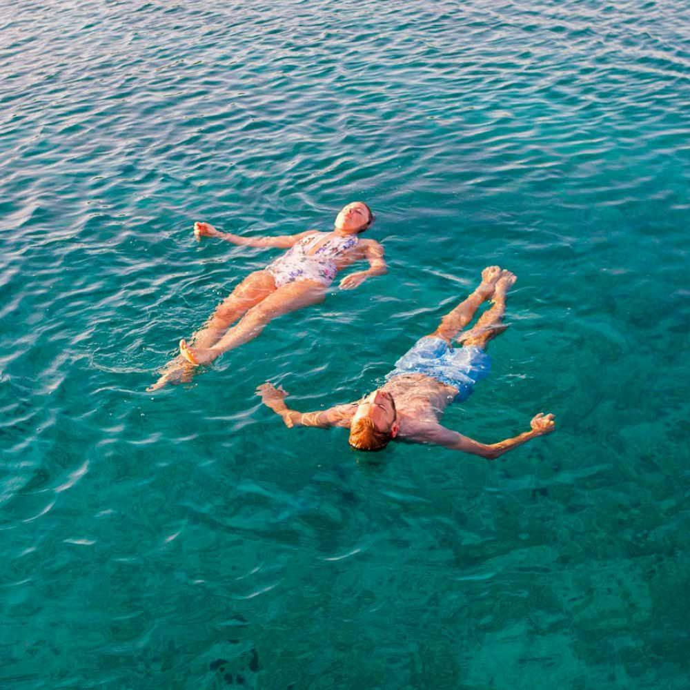 Couple floating in water