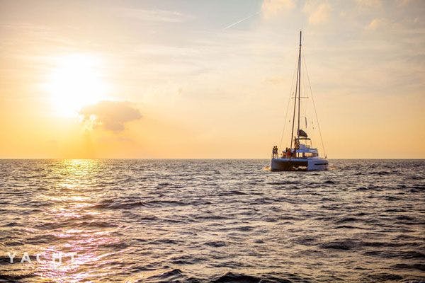 Sailing the Caribbean - See the sun set over the blue seas