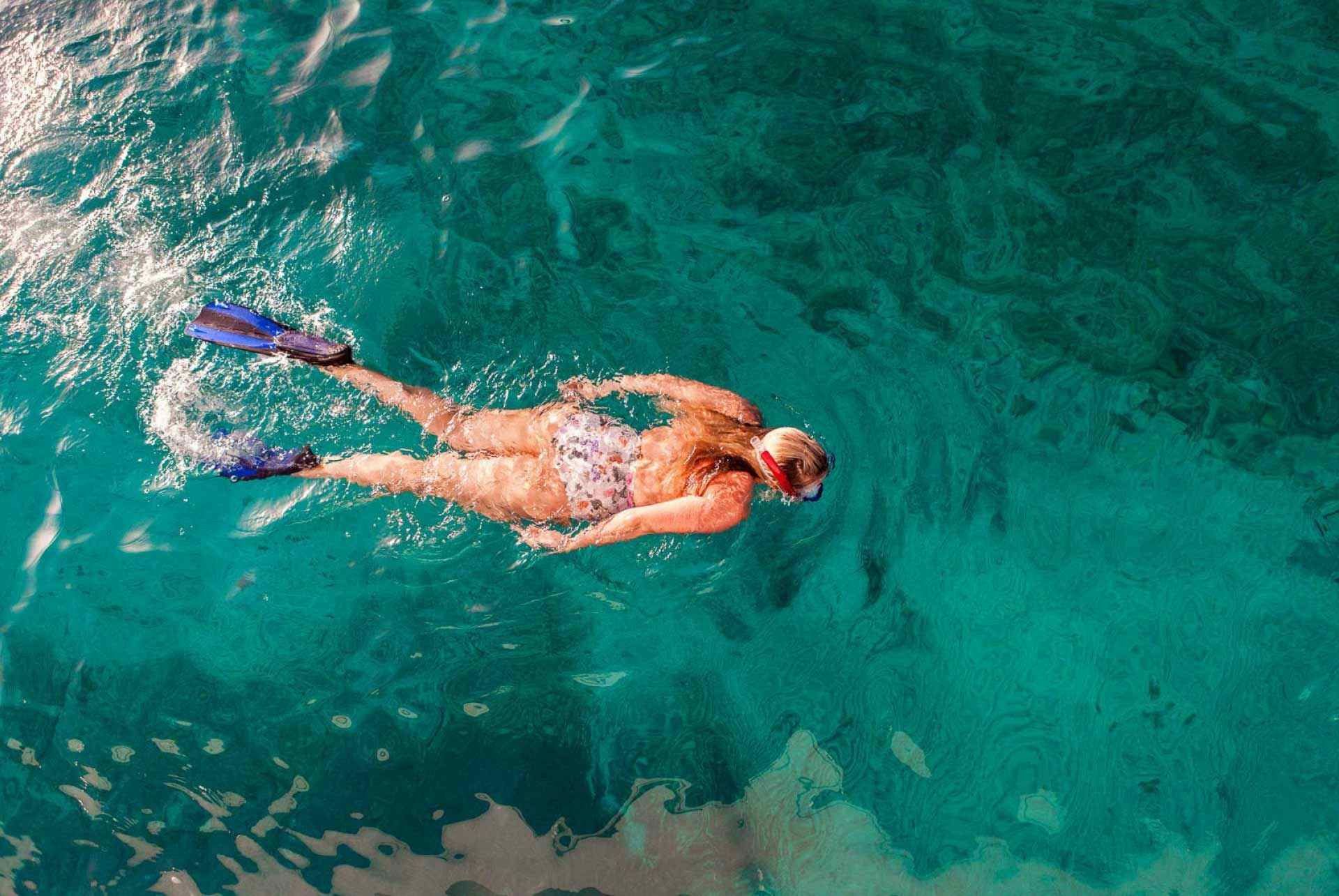 Woman snorkelling in Croatia