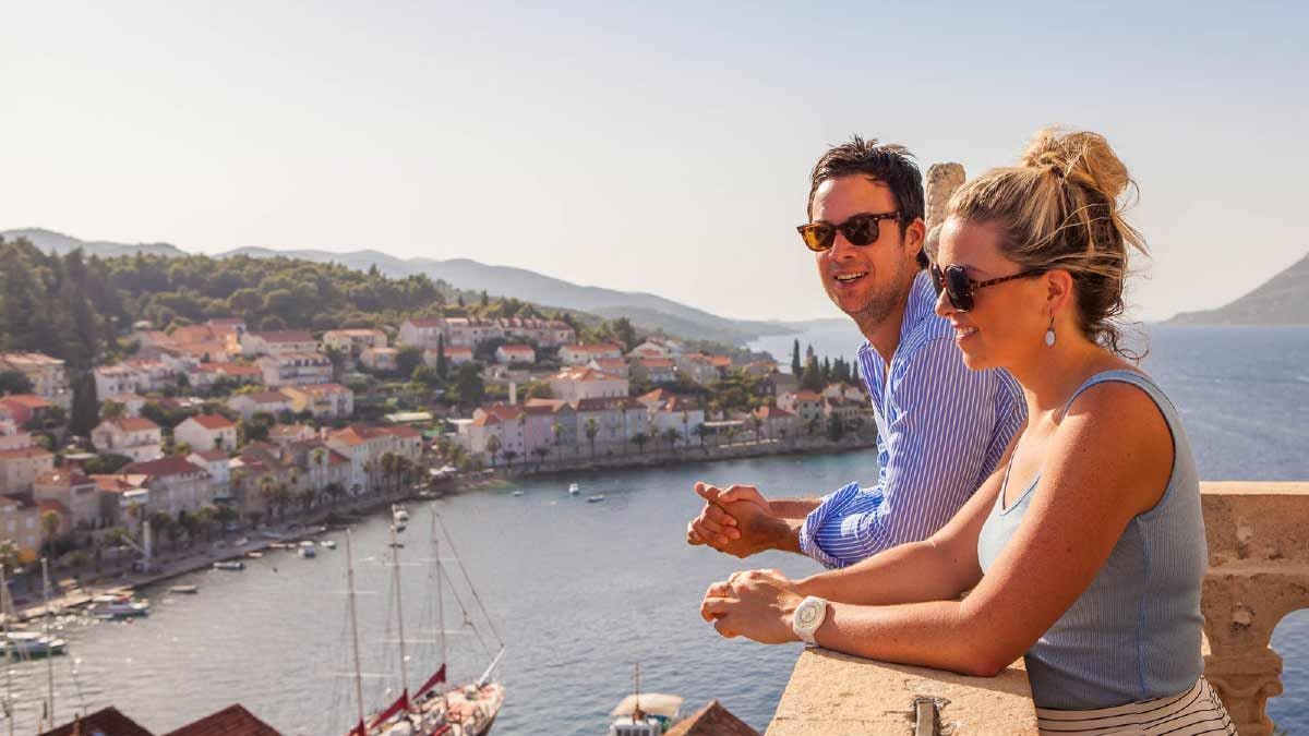 Couple enjoy the view up a tower in Korcula