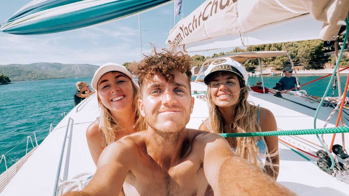 Group of friends on a Yacht Getaways catamaran