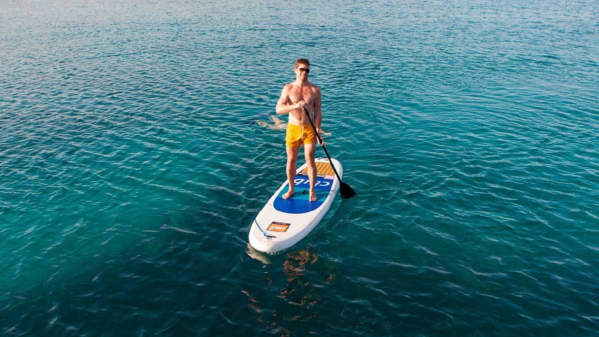 Man paddle boarding in Montenegro